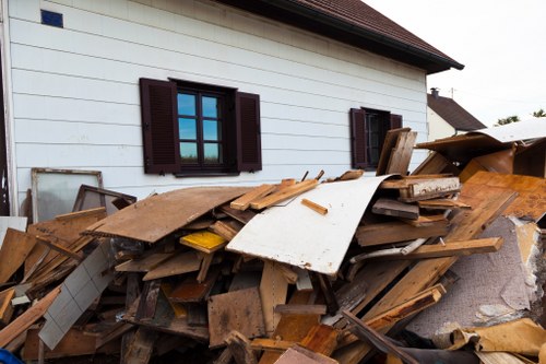Construction debris being removed by muck away professionals