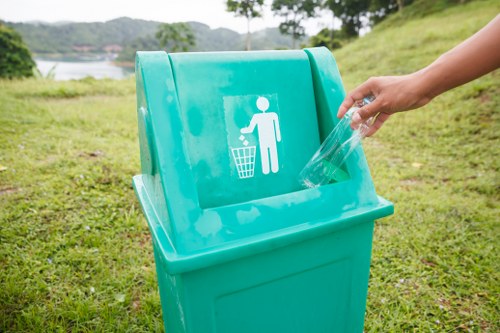 Person reviewing accessible documents and large-print invoices for skip hire